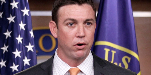 FILE - In this April 7, 2011 file photo, Rep. Duncan Hunter, R-Calif., speaks during a news conference on Capitol Hill in Washington. (AP Photo/Carolyn Kaster, File)