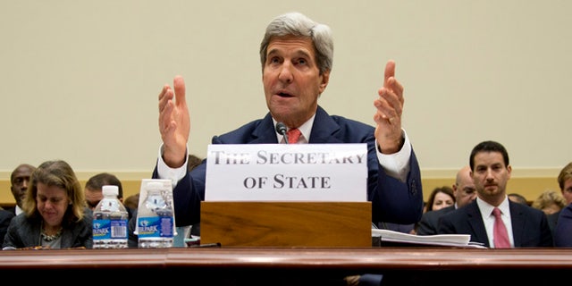 In this Thursday, Sept. 18, 2014 photo, Secretary of State John Kerry testifies on Capitol Hill in Washington during a House Foreign Affairs Committee hearing.