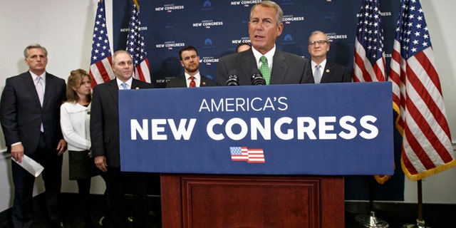 House Speaker John Boehner of Ohio speaks to reporters following a House GOP caucus meeting on Capitol Hill in Washington, Wednesday, Jan. 7, 2015.
