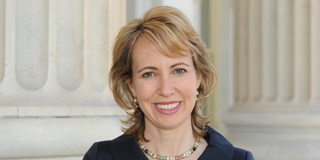 In this March, 2010 file photo, Rep. Gabrielle Giffords, Giffords poses for a photo. Giffords was critically wounded during a shooting at a political event Jan. 8 in Tucson, Ariz.