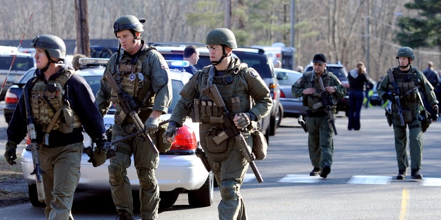 Connecticut State Police are on scene following a shooting at the Sandy Hook Elementary School in Newtown, Conn.