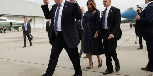President Donald Trump and first lady Melania Trump arrive at John Murtha Johnstown-Cambria County Airport in Johnstown, Pa., Tuesday, Sept. 11, 2018. Trump will be speaking during the September 11th Flight 93 Memorial Service in Shanksville, Pa. (AP Photo/Evan Vucci)