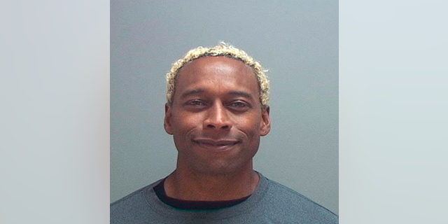 Anthony D. McClanahan, a former Canadian professional football player who trained with the Dallas Cowboys in the 1990s, was charged with killing his wife, prosecutors said on Monday.