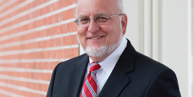 Dr. Robert Redfield Jr. was named the new director of the Centers for Disease Control and Prevention, the federal government’s top public health agency.