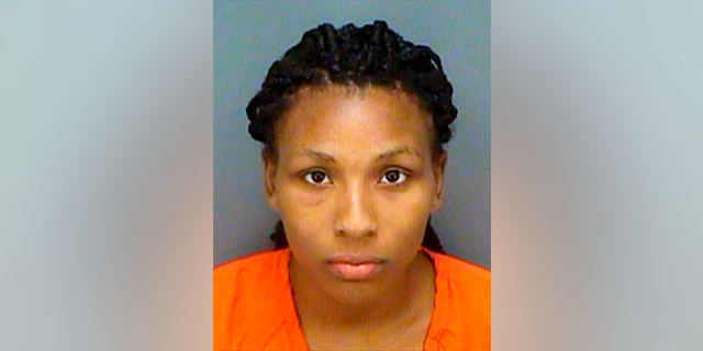 This Wednesday, Sept. 5, 2018 photo provided by the Pinellas County Jail shows Charisse Stinson, 21. She was arrested and charged with first-degree murder in the death of her two-year-old son, Jordan Belliveau. Investigators say Stinson struck Jordan in the face, knocking him into a wall hours before reporting him missing. The child's body was found in a wooded area. (AP Photo/Pinellas County Jail)