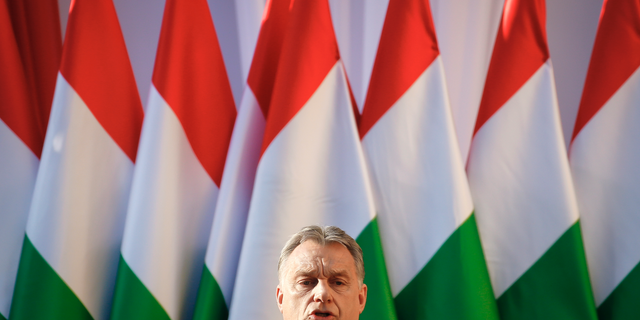 FILE - In this Friday, April 6, 2018 file photo Hungary's Prime Minister Viktor Orban speaks during the final electoral rally of his Fidesz party in Szekesfehervar, Hungary. The European Parliament is set to debate a move toward imposing political sanctions on Hungary for policies that opponents say are against democratic EU values and the rule of law. (AP Photo/Darko Vojinovic, file)