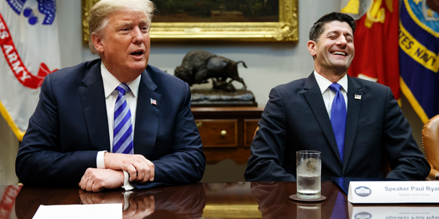 Speaker of the House Rep. Paul Ryan, R-Wis., laughs as he listens to President Donald Trump speak during a meeting with Republican lawmakers in the Roosevelt Room of the White House, Wednesday, Sept. 5, 2018, in Washington. (AP Photo/Evan Vucci)