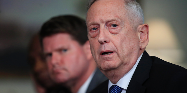 Defense Secretary Jim Mattis responds to a reporter's question during a meeting with and Philippine Secretary of National Defense Delfin Lorenzana at the Pentagon, Tuesday, Sept. 18, 2018. (AP Photo/Manuel Balce Ceneta)