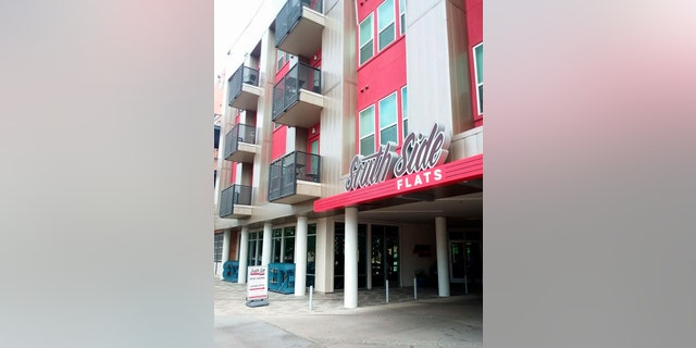 South Side Flats is shown in this Friday, Sept. 7, 2018 photo. A Dallas police officer returning home from work shot and killed a neighbor after she said she mistook his apartment for her own, authorities said Friday. The officer called dispatch to report that she had shot the man Thursday night, police said. She told responding officers that she believed the victim's apartment was her own when she entered it. (AP Photo/Ryan Tarinelli)