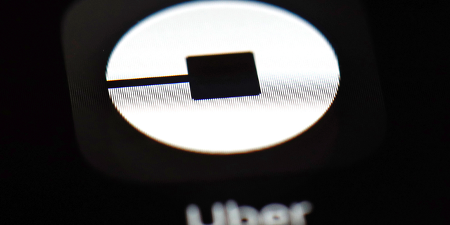 FILE - This March 20, 2018, file photo shows the Uber app on an iPad in Baltimore. (AP Photo/Patrick Semansky, File)