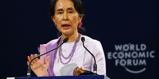 Myanmar leader Aung San Suu Kyi addresses participants during the opening session of the World Economic Forum on ASEAN Wednesday, Sept. 12, 2018 in Hanoi, Vietnam. The World Economic Forum has attracted hundreds of participants for the three-day forum with the theme: ASEAN 4.0: Entrepreneurship and the Fourth Industrial Revolution. (AP Photo/Bullit Marquez)