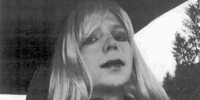 FILE - This undated file photo provided by the U.S. Army shows Pfc. Chelsea Manning wearing a wig and lipstick. Manning, a transgender soldier imprisoned for releasing classified military information, issued a statement Tuesday, May 9, 2017, ahead of her scheduled release May 17, from Fort Leavenworth, Kan., expressing gratitude to her supporters and to former President Barack Obama. Obama granted her clemency shortly before his term ended last year. (U.S. Army via AP, File)