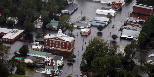 Floodwaters from Hurricane Florence inundate the town of Trenton, N.C., Sunday, Sept. 16, 2018. (AP Photo/Steve Helber)