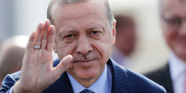 The government of Turkish President Recep Tayyip Erdogan has arrested tens of thousands of Turks and nationals of other countries in a post-coup crackdown. (AP Photo/Markus Schreiber)