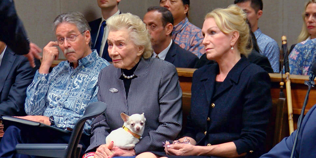 FILE - This March 15, 2018 file image from pool video shows 91-year-old Hawaiian heiress Abigail Kawananakoa, left, and her wife, Veronica Gail Worth, in a Honolulu courtroom. Board members of a foundation a 92-year-old heiress established for Native Hawaiians are calling for a judge to protect her $215 million trust. Many Native Hawaiians consider Abigail Kawananakoa to be the last Hawaiian princess because of her lineage. Her wealth is embroiled in a legal fight and a key court hearing is scheduled for Monday, Sept. 10, 2018. (Hawaii News Now via AP, Pool, File)