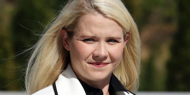 Elizabeth Smart arrives for a news conference Thursday, Sept. 13, 2018, in Salt Lake City. Smart says it appears there is no viable, legal recourse she can take to stop the release of one of her kidnappers. Smart said at a news conference Thursday in Salt Lake City that she only found out about 72-year-old Wanda Barzee's release shortly before the public did. (AP Photo/Rick Bowmer)