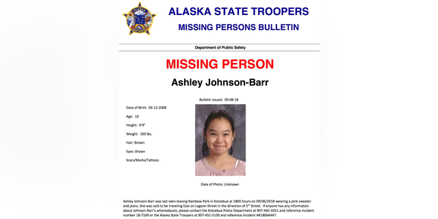This missing person poster released by Alaska State Troopers shows Ashley Johnson-Barr, who was last seen leaving Rainbow Park in Kotzebue, Alaska, on Sept. 6, 2018, wearing a pink sweater and jeans. A search that includes multiple FBI agents has yielded no sign of Johnson-Barr, who went missing in a remote, largely Inupiat Eskimo town north of the Arctic Circle on Alaska’s western coast. Now authorities are investigating whether foul play was involved. (Alaska State Troopers via AP)