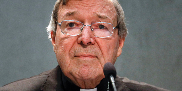 In this June 29, 2017 file photo, Cardinal George Pell meets the media, at the Vatican.
