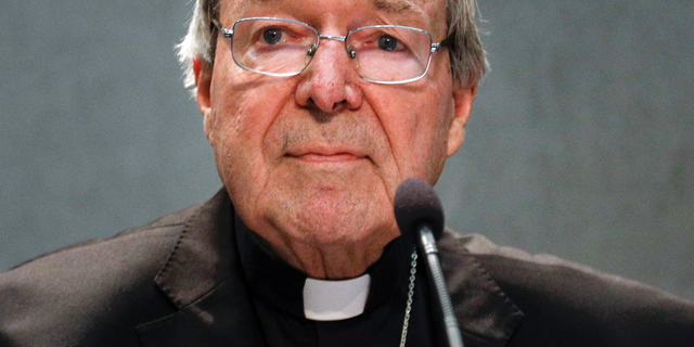 In this June 29, 2017 file photo, Cardinal George Pell meets the media, at the Vatican.