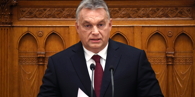 Removes references to the parliament president - Hungarian Prime Minister Viktor Orban, front, delivers his address during the opening of the autumn session of the Hungarian Parliament in Budapest, Hungary, Monday, Sept. 17, 2018. (Tamas Kovacs/MTI via AP)