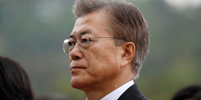 New South Korea's President Moon Jae-in arrives at the National Cemetery in Seoul, South Korea Wednesday, May 10, 2017. Moon visited the national cemetery where he honored the country's former presidents, independence fighters and war heroes as he began his presidential duties. (Kim Hong-ji/Pool Photo via AP)