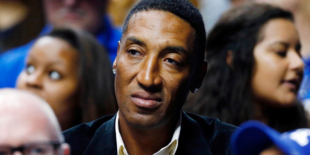 Former NBA player Scottie Pippen watches an NCAA college basketball game in 2015.