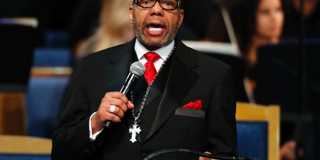 FILE - In this Aug. 31, 2018, file photo, the Rev. Jasper Williams, Jr., delivers the eulogy during the funeral service for Aretha Franklin at Greater Grace Temple, in Detroit. The controversial eulogy laid bare before the world what some black women say they have experienced for generations: sexism and inequality in their houses of worship every Sunday. (AP Photo/Paul Sancya, File)