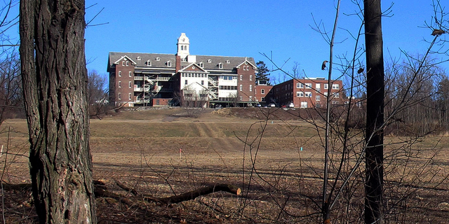 FILE - This Feb. 22, 2015, file photo shows buildings and property of Burlington College in Burlington, Vt. Prior to housing the college, the building was home to St. Joseph's Orphanage. Vermont Attorney General T.J. Donovan said Monday, Sept. 10, 2018, a task force is being launched to investigate abuse allegations at the orphanage, which closed in 1974. The Roman Catholic bishop of Burlington said the diocese will cooperate. (AP Photo/Wilson Ring, File)