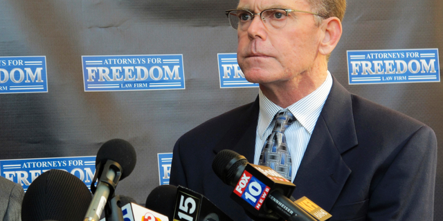 FILE - In this Feb. 2, 2018, file photo, Douglas Haig takes questions from reporters at a news conference in Chandler, Ariz. Haig, who has acknowledged selling ammunition to the gunman in the deadliest mass shooting in the nation's modern history, is due for arraignment Monday, Sept. 10, 2018, in federal court in Las Vegas. (AP Photo/Brian Skoloff, File)
