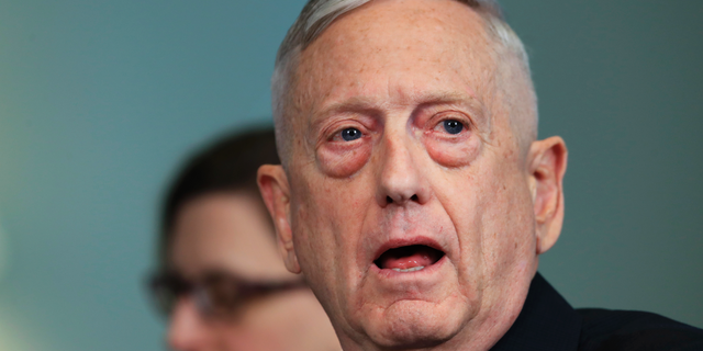 FILE - In this Tuesday, May 1, 2018, file photo, Secretary of Defense Jim Mattis answers a reporter's question during a meeting with Macedonian Defense Minister Radmila Sekerinska at the Pentagon. Mattis arrived in Macedonia on Monday, Sept. 17, condemning Russian efforts to use its money and influence to build opposition to an upcoming vote that could pave the way for the country to join NATO, a move Moscow opposes. (AP Photo/Manuel Balce Ceneta, File)