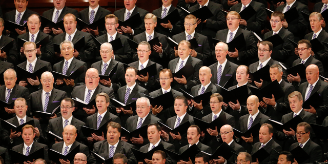The Mormon Tabernacle Choir performs during the morning session of the two-day Mormon church conference