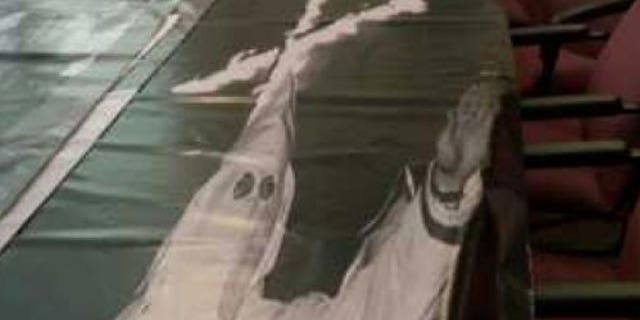 Greenfield, Indianapolis school stands behind controversial KKK banner used in school play.