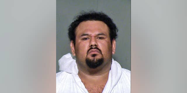 This undated law enforcement booking photo provided by the Maricopa County, Ariz., Sheriff's Office shows Apolinar Altamirano. A surveillance video that captured the killing of a Phoenix-area convenience store clerk shows the suspect, Altamirano, calmly walking behind the counter after pulling the trigger, stepping over the fallen victim and grabbing several packs of Marlboros before slowly exiting. The chilling depiction was outlined in a court document Friday, Jan. 23, 2015, as a Maricopa County Superior Court judge set bail at $1 million. (AP Photo/Maricopa County Sheriff's Office)