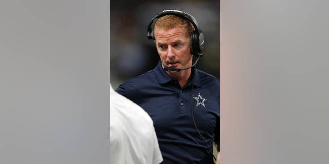 FILE - In this Sept. 21, 2014, file photo, Dallas Cowboys head coach Jason Garrett watches from the sidelines during the third quarter of an NFL football game against the St. Louis Rams in St. Louis. The Dallas Cowboys overcame a 21-point deficit to win in regulation for the first time in team history. (AP Photo/Tom Gannam, File)