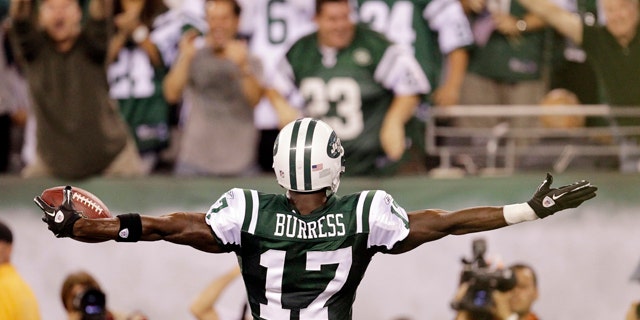 Sept. 11, 2011: New York Jets wide receiver Plaxico Burress celebrates after catching a 26-yard touchdown pass during the second half of an NFL football game against the Dallas Cowboys.