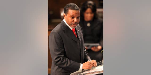 FILE - In this Feb. 7, 2007, file photo, megachurch pastor Creflo Dollar speaks during funeral services for HERO driver Spencer Pass at World Changers Church International in College Park, Ga. Dollar is seeking donations to buy a private jet valued at more than $65 million. The website of Creflo Dollar Ministries asked people Friday, March 13, 2015, to "Sow your love gift of any amount" to help the ministry buy a Gulfstream G650 airplane. (AP Photo/Atlanta Journal-Constitution, Phil Skinner, File)