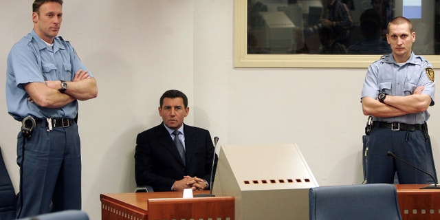 FILE: Former Croatian General Ante Gotovina, center, during his initial appearance at the courtroom of the Yugoslav war crimes tribunal in The Hague, the Netherlands.