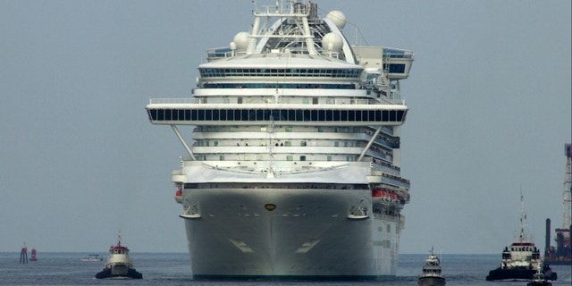 The cruise ship Crown Princess travels into Port Canaveral, Florida.