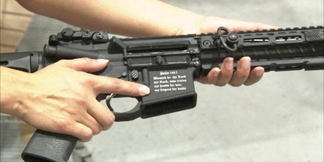 Photo shows Spike's Tactical Crusader etched with a Bible verse.(WOFL-TV)