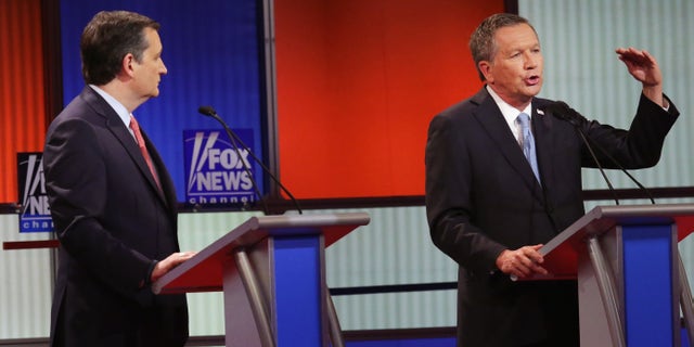 DETROIT, MI - MARCH 03: Republican presidential candidates (Lto R) Sen. Ted Cruz (R-TX) and Ohio Gov. John Kasich participate in a debate sponsored by Fox News at the Fox Theatre on March 3, 2016 in Detroit, Michigan. Voters in Michigan will go to the polls March 8 for the State's primary. (Photo by Chip Somodevilla/Getty Images)