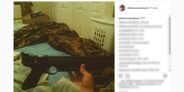 A picture on Nikolas Cruz's Instagram page shows him holding a rifle.