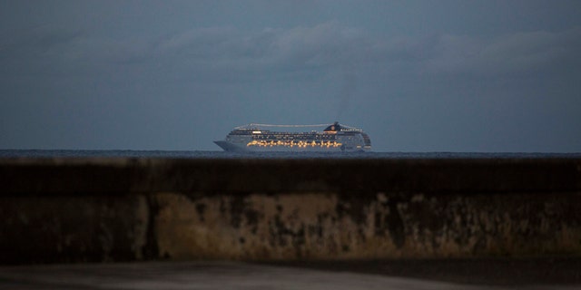 This Jan. 21, 2016 photo shows the MSC Opera cruiser off the coast of Havana as it departs Cuba. Cuban state media announced on Friday, April 22, 2016 the loosening of the government's policy that banned Cuban-born people from arriving by sea. Those prohibitions were put in place in response to Cuban exiles launching attacks from the water in the first years after the Cuban revolution. (AP Photo/Desmond Boylan)