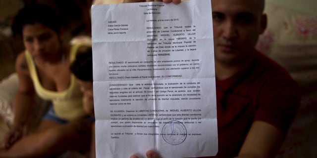 Jan. 9, 2015 - Dissident Miguel Alberto Ulloa, 25, holding his release document, after his release, in Havana, Cuba. Cuba has completed the release of 53 political prisoners that was part of last month's historic deal between the U.S. and Cuba, the Obama administration said Monday.