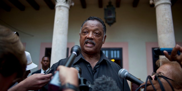 Rev. Jesse Jackson talks with journalists after a meeting with members of FARC in Havana, Cuba, Sunday, Sept. 29, 2013.