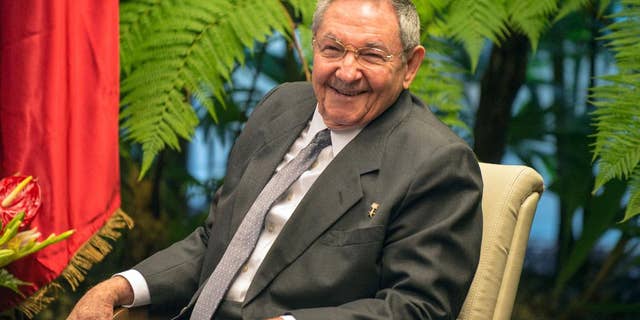 FILE - In this March 27, 2014 file photo, Cuba's President Raul Castro smiles during a meeting with Vietnam's Prime Minister Nguyen Tan Dung at Revolution Palace in Havana, Cuba. Castro is marking his 83rd birthday privately on Tuesday, June 3, 2014, a milestone that is passing without fanfare. Castro has said he intends to remain in office no longer than his current term, which ends in 2018. (AP Photo/Adalberto Roque, Pool, File)