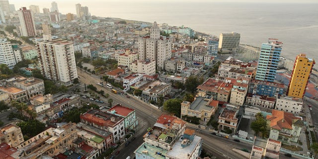 Tightly packed apartment buildings in varying states of repair and disrepair stand in the Vedado neighborhood near the historic Malecón oceanfront drive January 23, 2015 in Havana, Cuba. (Photo by Chip Somodevilla/Getty Images)