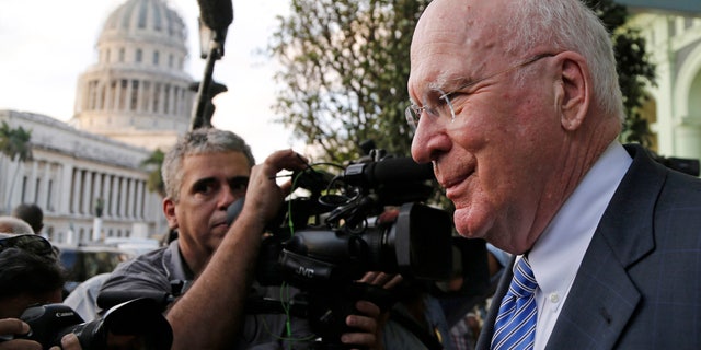 U.S. Senator Patrick Leahy from Vermont leaves after giving a press conference near the capitol building in Havana, Cuba, Monday, Jan. 19, 2015. Leahy, who is heading the first congressional delegation visit to Cuba since President Barack Obama announced in December plans for renewed relations with Cuba, met with Castro on past trips to Cuba but did not do so again on Monday, two days before Assistant Secretary of State Roberta Jacobson arrives in Havana to negotiate the reopening of the U.S. Embassy. (AP Photo/Desmond Boylan)