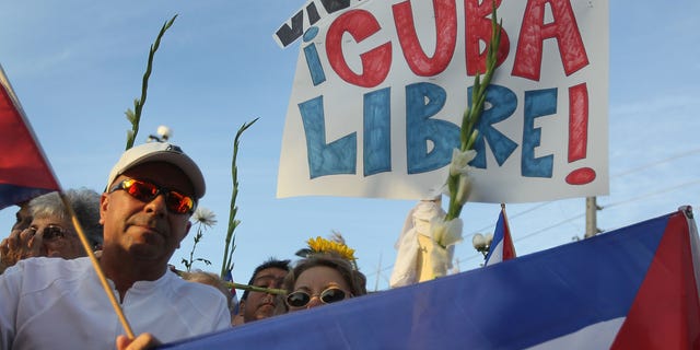People show their support for an activist group in Cuba.
