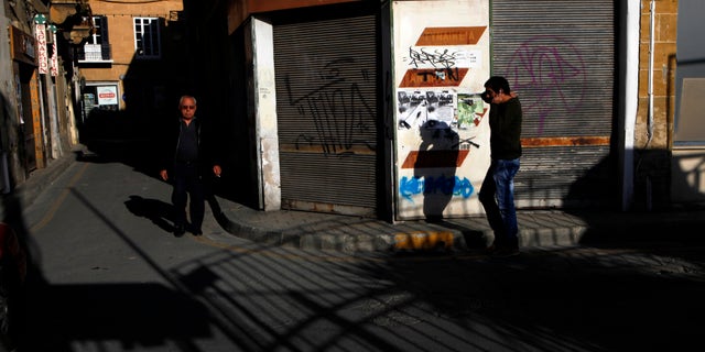 March 23, 2013: People walk at the old city of capital Nicosia, Cyprus.