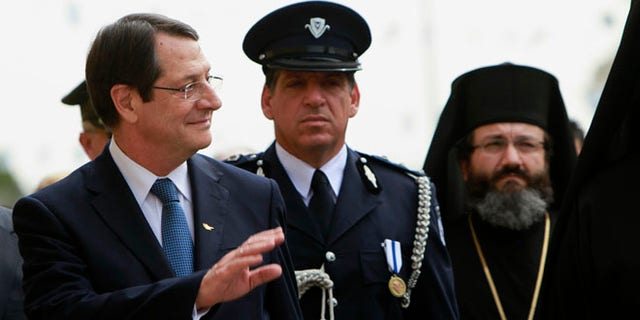 President Nicos Anastasiades pledged to investigate his own family after media allegations that a company partly owned by an in-law had yanked millions of euros out of the country days before the crisis began.